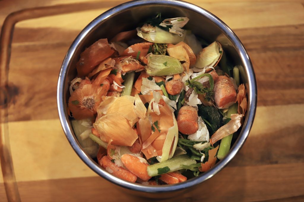 Bone broth vegetable scraps in the pot