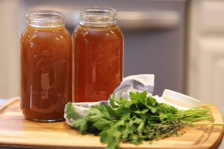 bone broth in half gallon glass jars