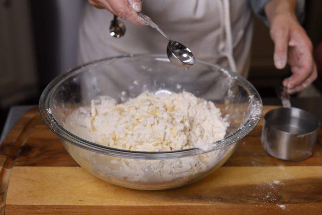 adding ice water to make pie crust