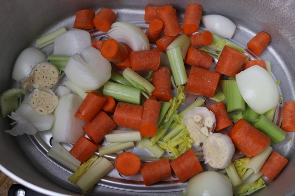 chopped vegetables in a roasting pot