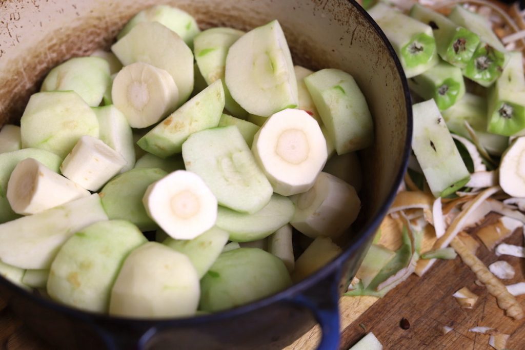 aples and parsnips peeled in a pot